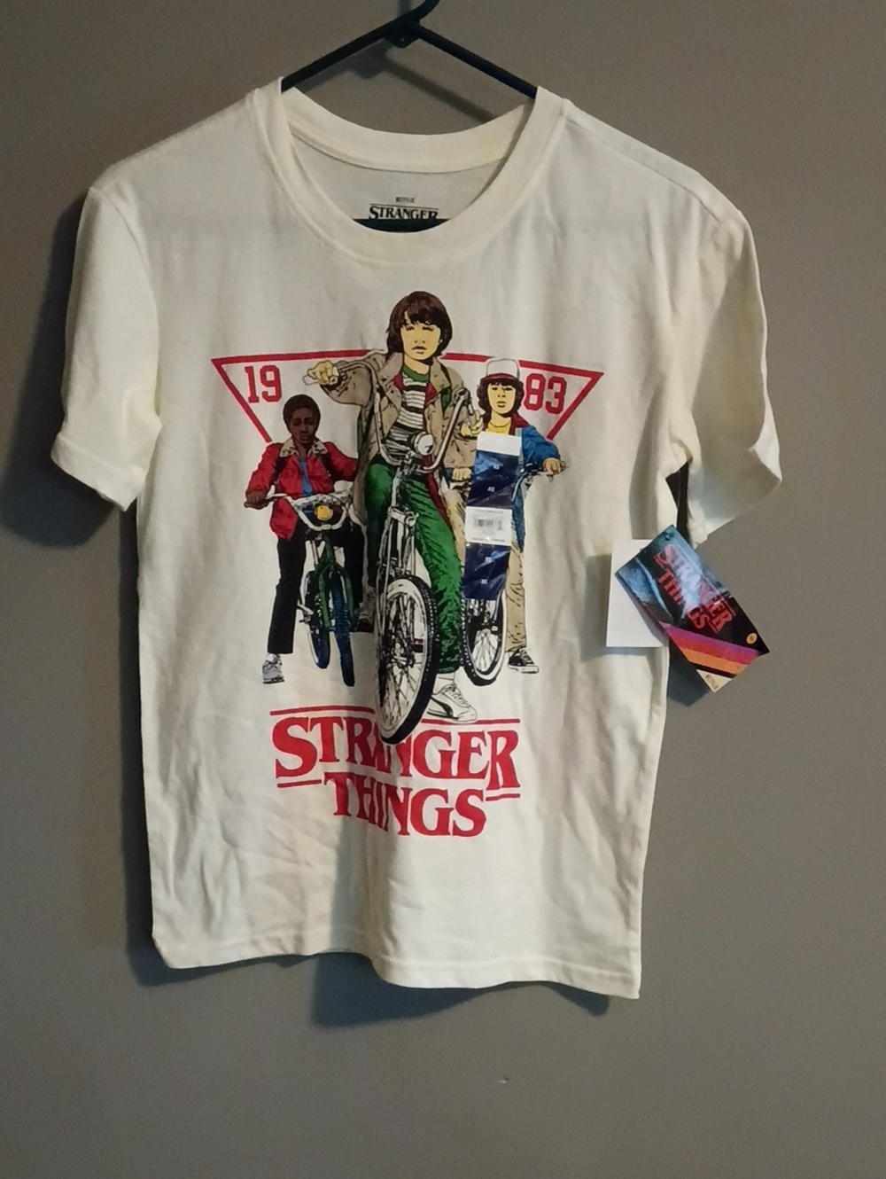 Netflix Stranger Things Cream Tee with Retro Bike Graphic